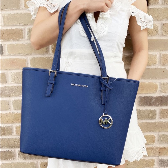 Michael Kors Handbags - SALE FIRM 👜💕-Michael Kors Carryall Tote Blue